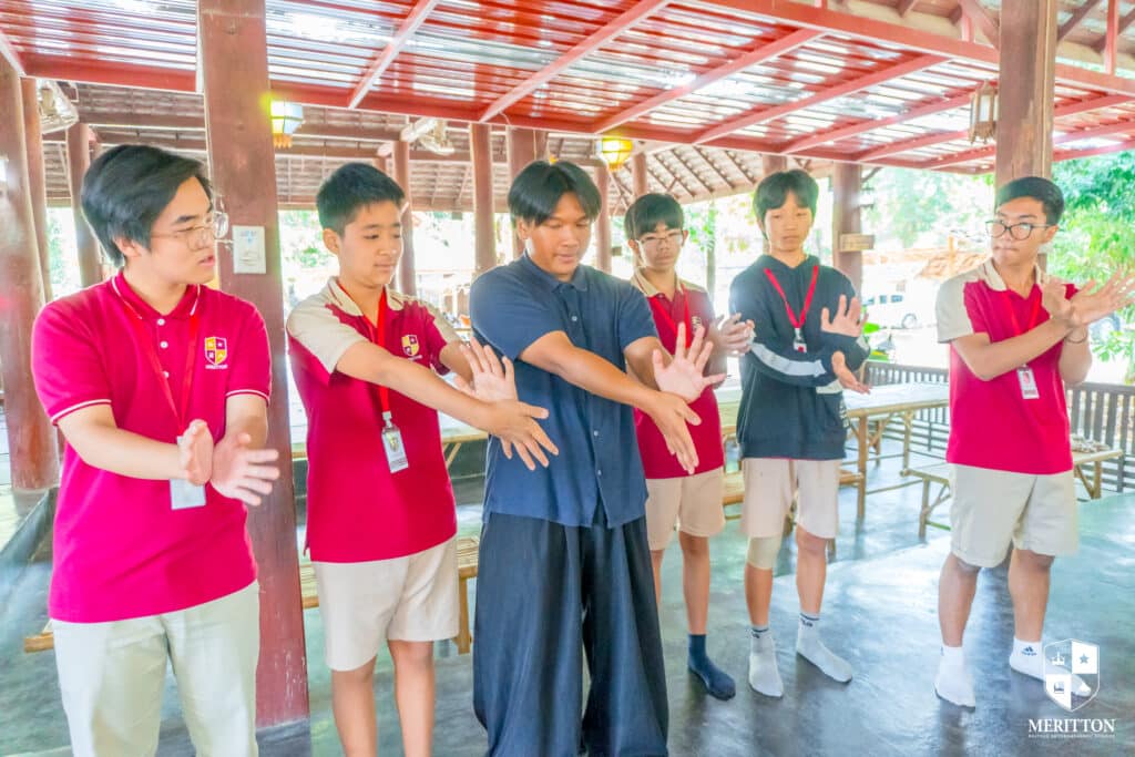 Student leaning Thai Dance